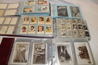 Five box albums containing a large collection of film star related trade cards including numerous