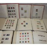 Nine folder albums containing a large and comprehensive collection of GB stamps, George VI onwards,