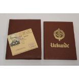 A Second War German Nazi SA certificate booklet for the bronze sports badge awarded in 1938 and