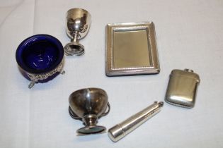 Two silver miniature trophy cups, small silver cheroot holder case,