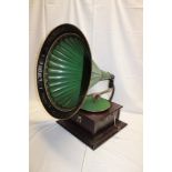 An old table top gramophone by Columbia in mahogany square case with original green painted metal