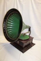 An old table top gramophone by Columbia in mahogany square case with original green painted metal