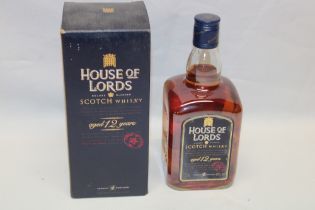 A bottle of the House of Lords whisky in original box