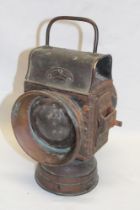 An early brass motoring lamp by Wynco & Sons Birmingham with internal oil fitment