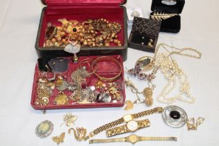 A selection of various costume jewellery including 9ct gold earrings and other earrings,