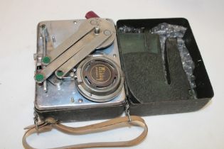 An unusual Japanese "Mikky Phone" a miniature portable folding gramophone in painted metal case
