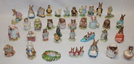 A collection of 35 Beswick Beatrix Potter china character figures,