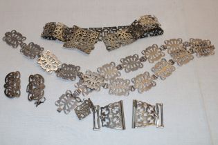 Two Art Nouveau-style silver plated belts with buckles and related items