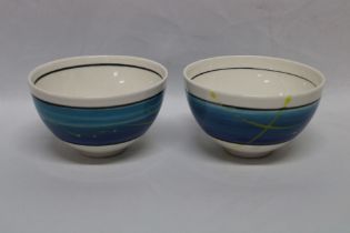 A pair of Panagona Pottery Tasmania circular bowls with decorated rims by Bill Thomas