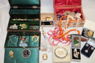 A quantity of various costume jewellery including necklaces, brooches, wristwatches,