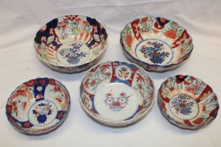 Five various 19th century Japanese Imari pottery circular bowls with painted floral decoration,
