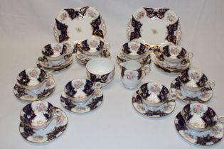 A Radford's Fenton bone china floral part tea set comprising ten tea cups, eight saucers,