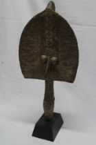 A 20th century African-style brass-clad fertility figure,