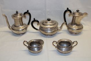 A good quality silver-plated five-piece tea and coffee set comprising oval coffee pot with ebonised