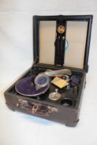 An unusual portable gramophone with chromium plated mounts,