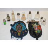 Various cut-glass scent bottles including some silver mounted examples;