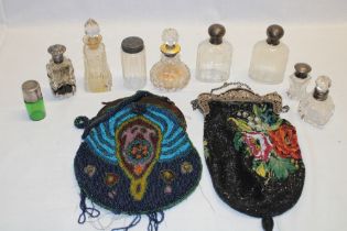 Various cut-glass scent bottles including some silver mounted examples;