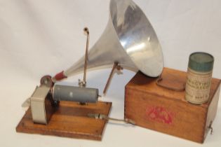 An unusual French clockwork phonograph with cockerel trade mark in oak case and cover with