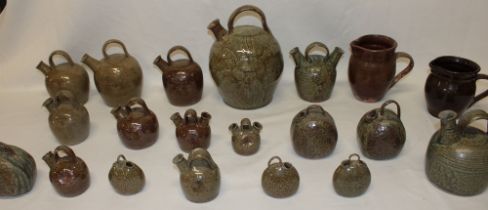 Twenty various Cornish studio pottery tapered water vessels,