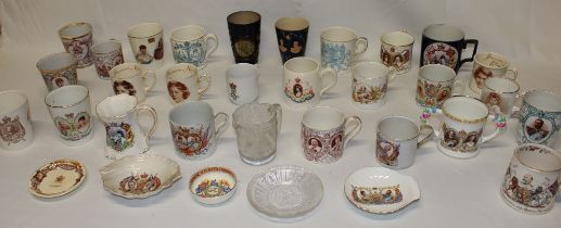 A collection of various commemorative mugs and beakers including Royal Doulton 1902 Edward VII