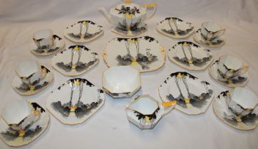 A Shelley Art Deco "Sunset and Tall Trees" pattern china tea set comprising of an octagonal tea pot