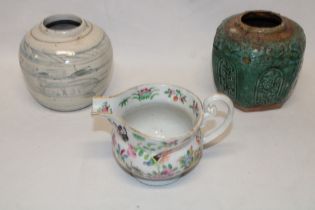 Two various Eastern pottery tapered gift jars and a Cantonese china sauce-boat with bird and floral