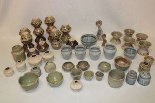 A selection of Cornish studio pottery including small bowls, vases,