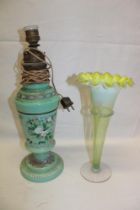 A Victorian opaque glass oil lamp with detachable font (damaged) and floral decoration and an