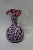 A Venetian glass tapered ornamental ewer with millefiori decoration,