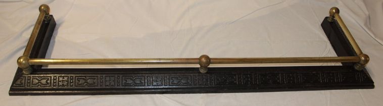A Victorian brass mounted cast iron rectangular fire fender,