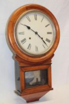 An old wall clock with painted circular dial in polished walnut drop-dial case