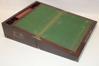 A 19th century brass mounted mahogany writing slope with fitted interior including Morocco lined