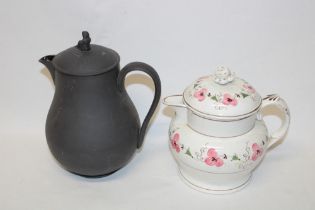 A Wedgwood black basalt tapered water jug with figure decorative finial,