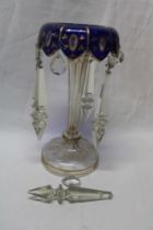 A Victorian Bohemian-style blue tinted glass table lustre with glass lozenge droplet decoration,