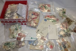 Numerous packets of GB stamps, Victoria onwards including postage dues etc.