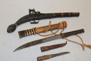 A Burmese short sword in bound wooden scabbard,