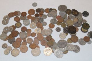 A selection of various Foreign coins including some silver examples