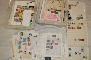 Two boxes containing numerous album pages of GB and World stamps