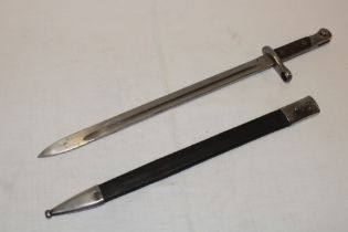 A Spanish model 1893/13 Mauser bayonet with 15½" single edged Toledo blade in steel mounted leather
