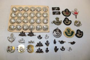 A selection of Light Infantry badges and insignia together with anodised buttons etc.