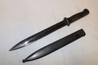 A Second War German K98 Mauser bayonet with 10" blackened steel blade marked "41 asw" in steel