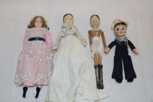 Two various old peg dolls,