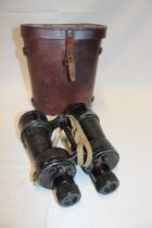 A pair of Second War Naval X7 MK5 binoculars in leather carrying case dated 1944