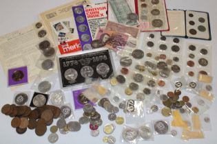 A selection of mixed GB and Foreign coins including pre-decimal coins, commemorative crowns,