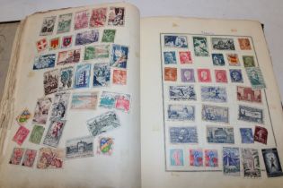 A folder album containing a selection of mixed World stamps