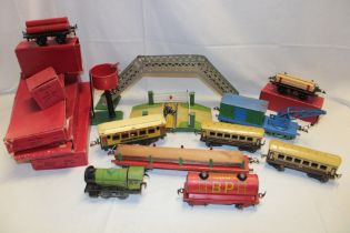 Hornby 0 gauge - various boxed points, a selection of carriages, tin plate footbridge,