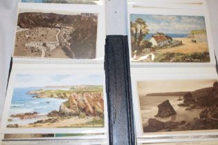 An album of various black and white and coloured postcards - Cornish scenes mainly Newquay