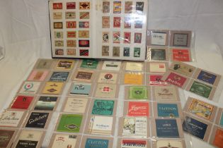 An album containing a selection of cigarette packet fronts,