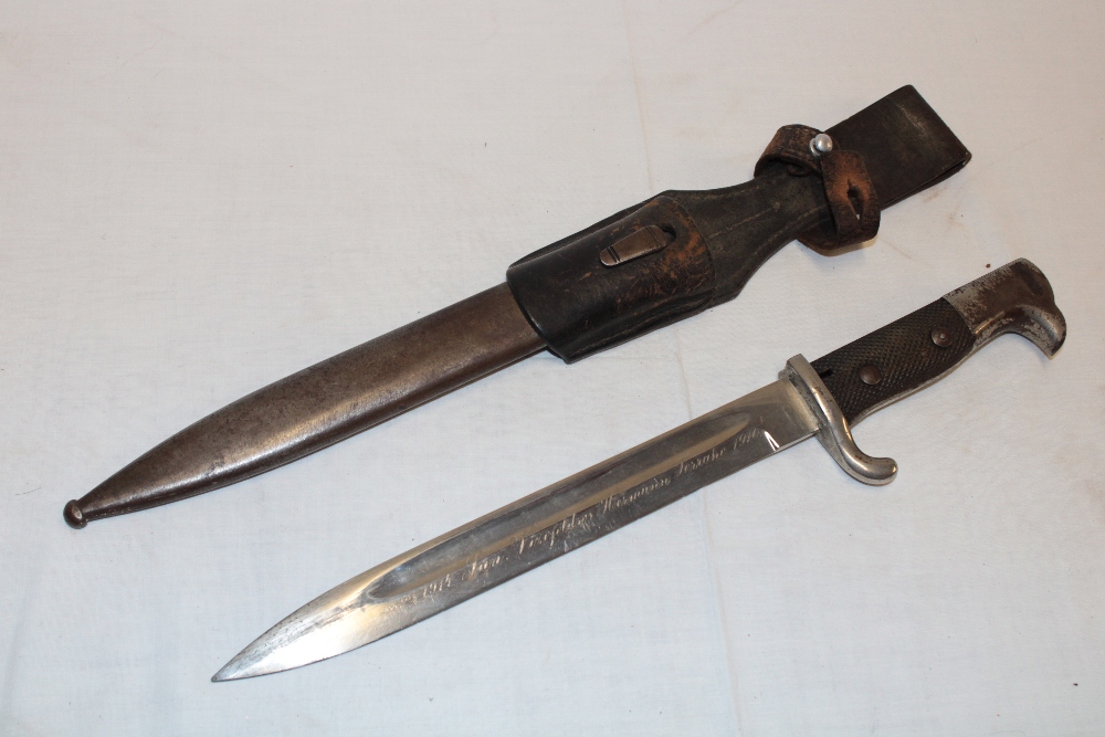 A Second War German Mauser bayonet with 10" steel blade etched "1914 San Virefeleen Hermann Terrake