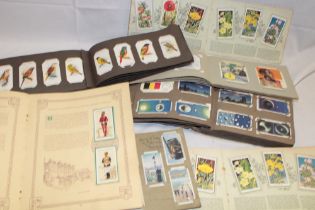 Various albums of cigarette cards including Players Aviary and Cage Birds and others etc.